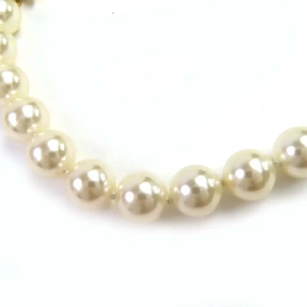 CHANEL White Pearl Logo Necklace
